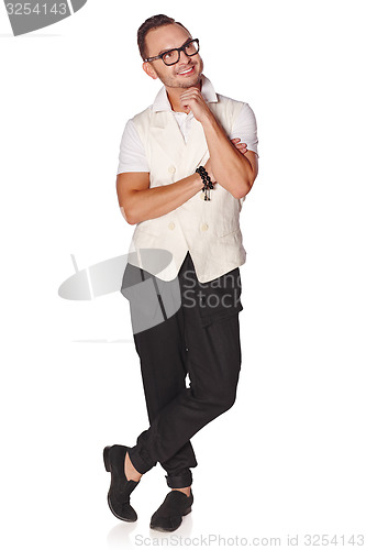 Image of Young pensive man looking up