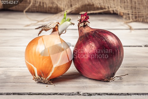 Image of Onions on a wooden table