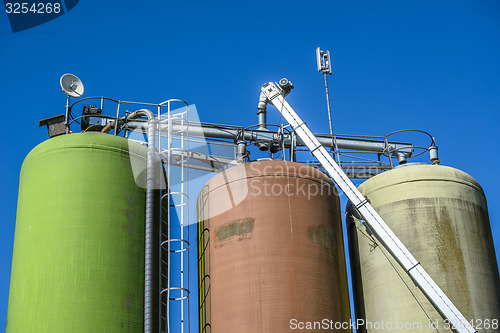 Image of Silos on blue background