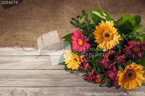 Image of Flower bouquet on wood