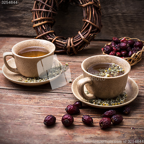 Image of Two ceramic cups brewed tea 