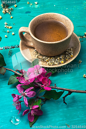 Image of tea brewed with chamomile in ceramic mugs