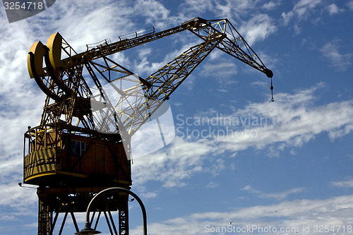 Image of street lamp clouds and crane