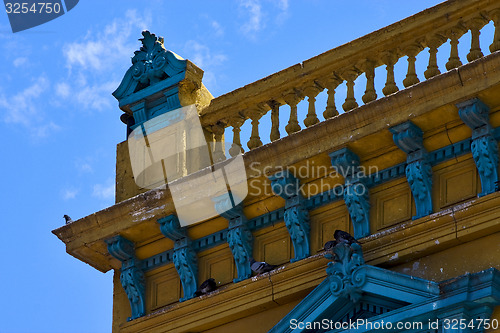 Image of  old blue yellow little terrace  and roof  