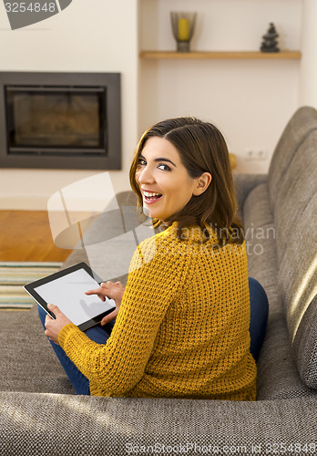 Image of Woman using a digital tablet