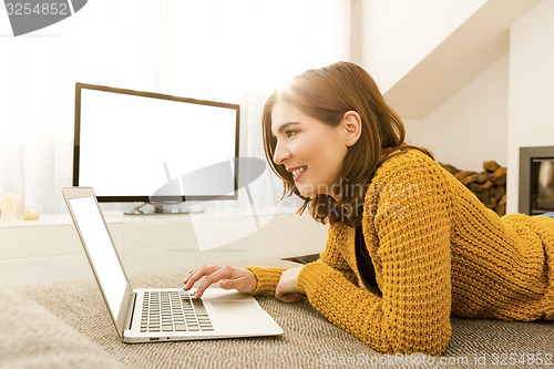 Image of Woman working with her laptop