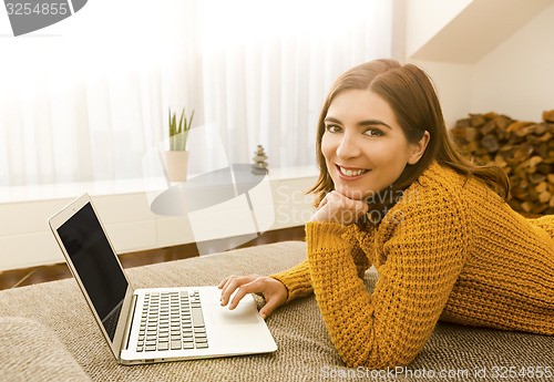 Image of Woman working with her laptop