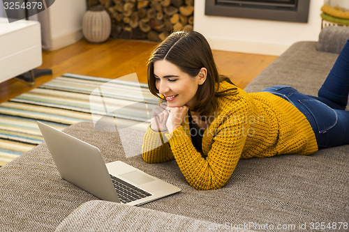 Image of Woman working with her laptop