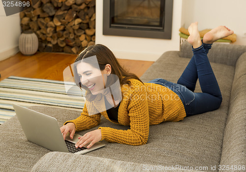 Image of Woman working with her laptop