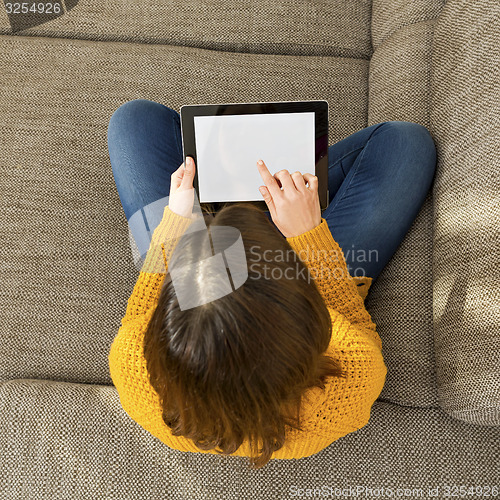 Image of Woman using a digital tablet