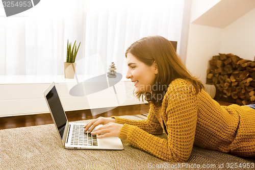 Image of Woman working with her laptop