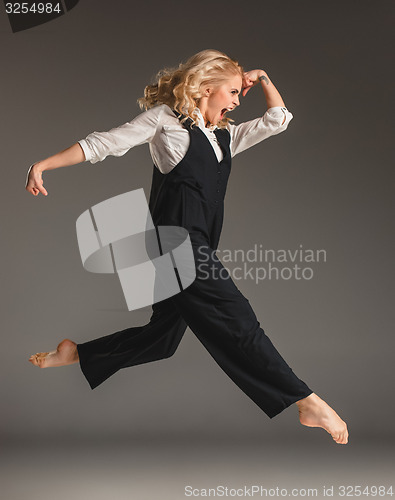 Image of Beauty blond woman in ballet jump