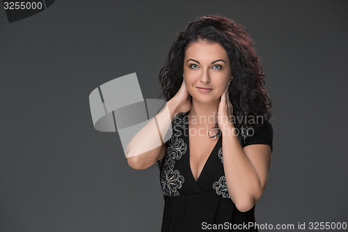 Image of Portrait of beautiful dark-haired young woman