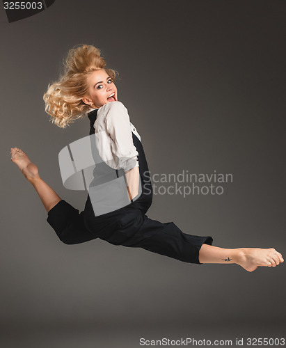 Image of Beauty blond woman in ballet jump