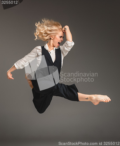Image of Beauty blond woman in ballet jump