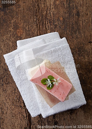 Image of white towels and soap bar