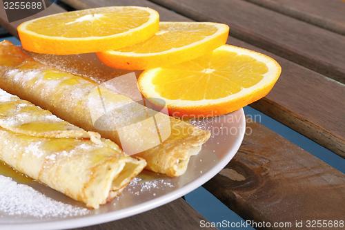 Image of pancakes with oranges