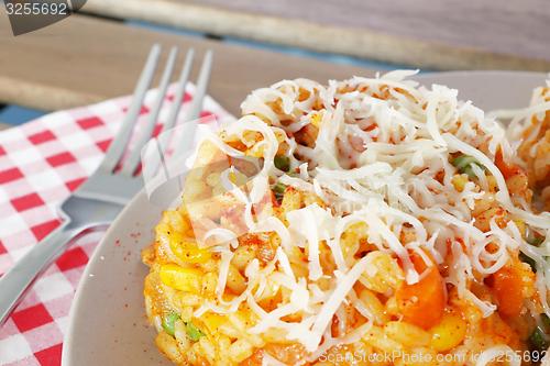 Image of rice with vegetables and cheese