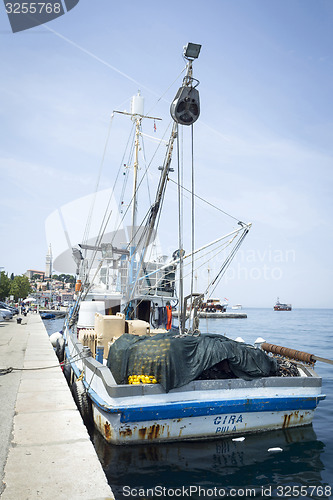 Image of Fisher boat moored at dock in Rovinj 