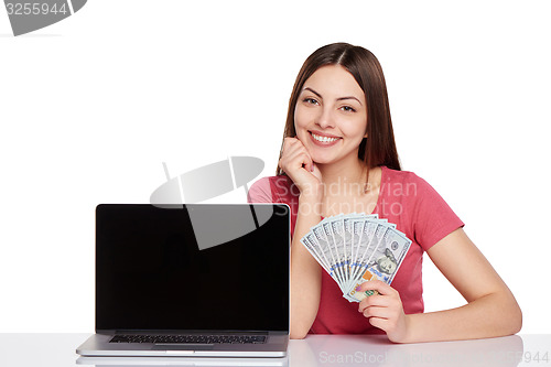 Image of Woman showing  laptop screen