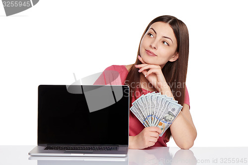 Image of Woman showing  laptop screen