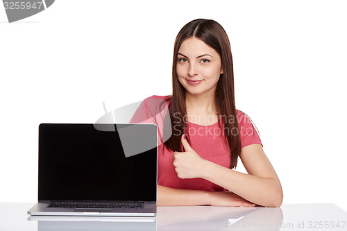 Image of Woman showing  laptop screen