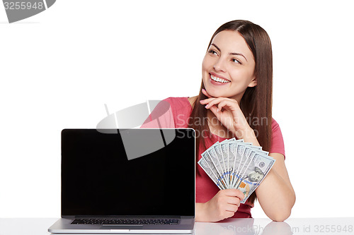 Image of Woman showing  laptop screen