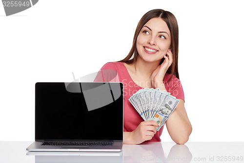 Image of Woman showing  laptop screen