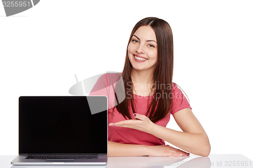 Image of Woman showing  laptop screen