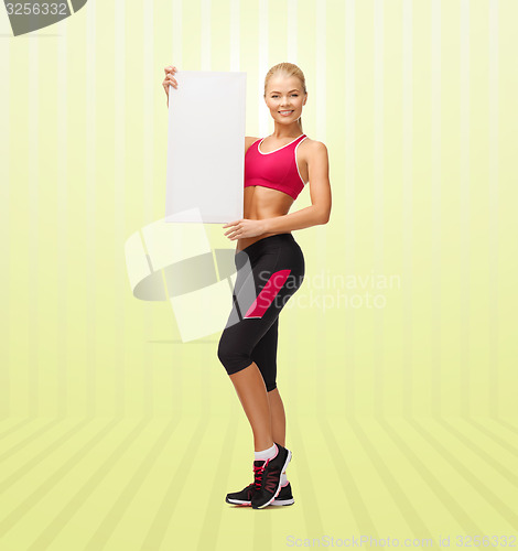 Image of sportswoman with white blank board