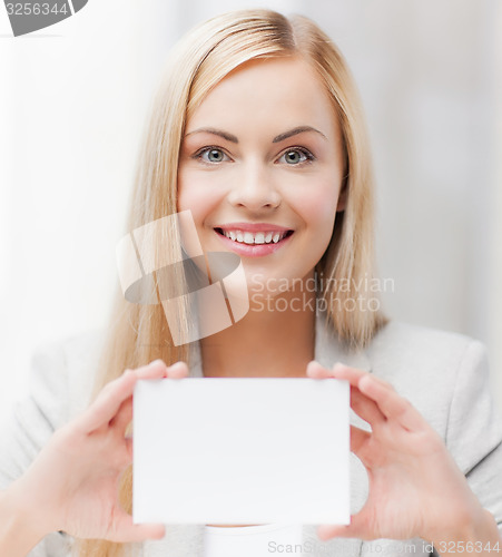 Image of woman with blank business or name card