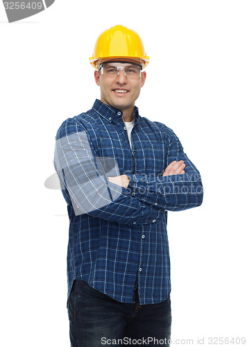 Image of smiling man in helmet with gloves