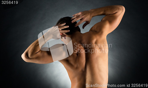 Image of young male bodybuilder from back