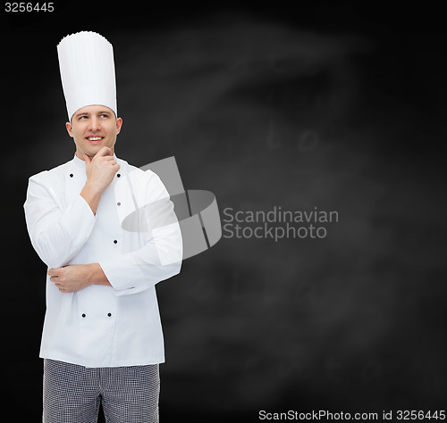 Image of happy male chef cook thinking