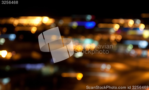 Image of colorful bright lights on dark night background