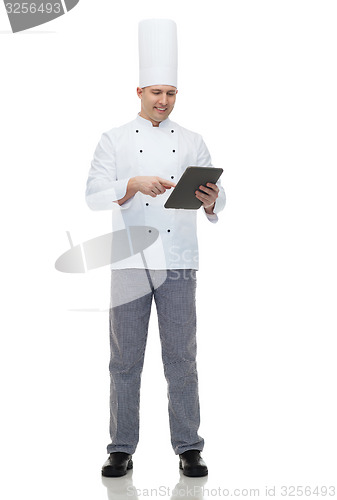 Image of happy male chef cook holding tablet pc