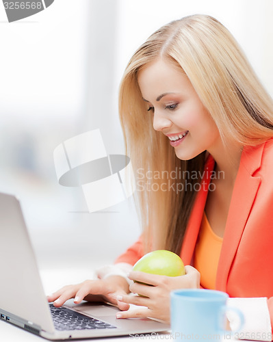 Image of businesswoman with laptop