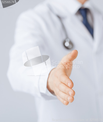 Image of male doctor with open hand ready for hugging