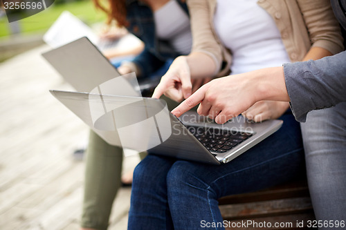 Image of close up of students or teenagers with laptop
