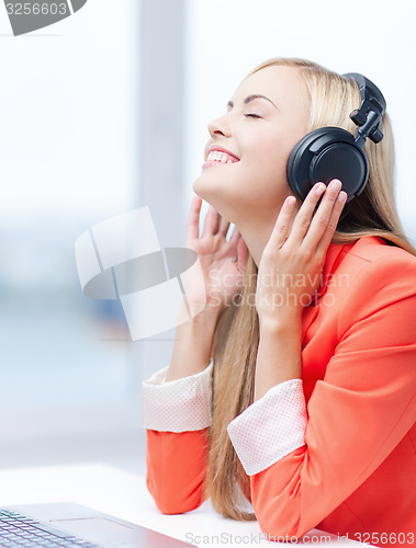 Image of woman with headphones