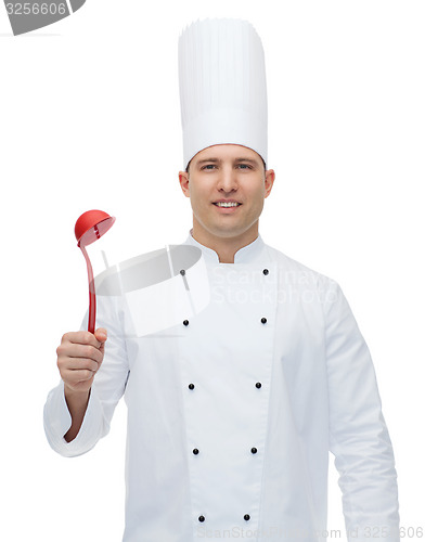 Image of happy male chef cook holding ladle