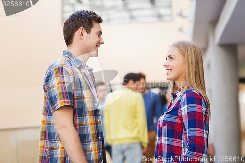 Image of group of smiling students outdoors