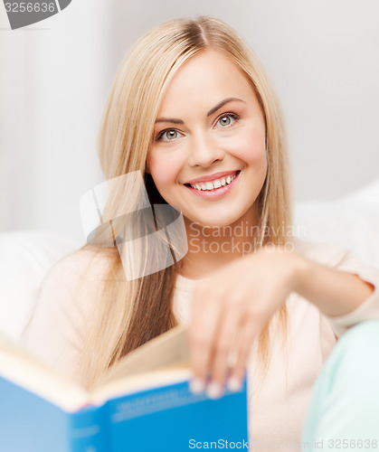 Image of woman reading book