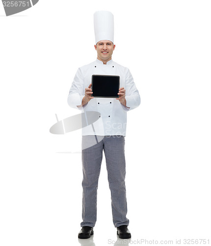 Image of happy male chef cook showing with tablet pc