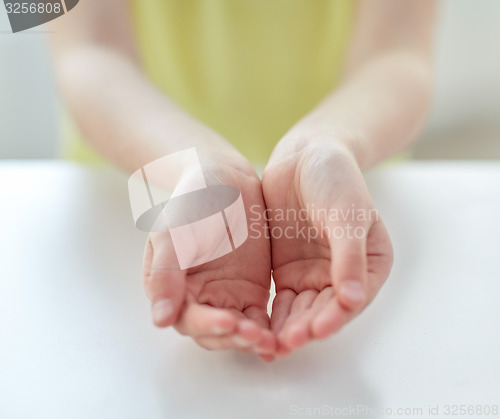 Image of close up of child cupped hands