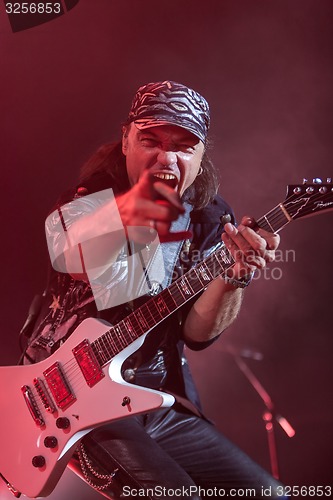 Image of DNIPROPETROVSK, UKRAINE - OCTOBER 31: Matthias Jabs from Scorpions rock band performs live at Sports Palace SC \"Meteor\". \"Final tour\"concert on October 31, 2012 in DNIPROPETROVSK, UKRAINE