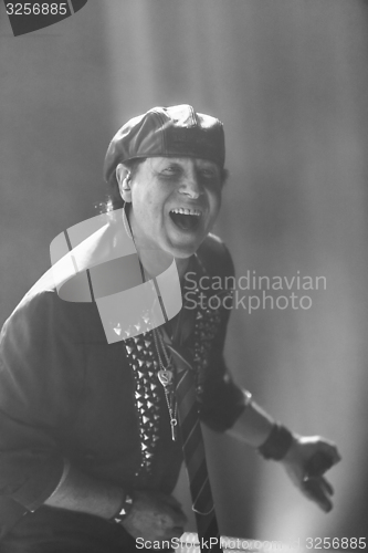 Image of DNIPROPETROVSK, UKRAINE - OCTOBER 31: Klaus Meine from Scorpions rock band performs live at Sports Palace SC \"Meteor\". \"Final tour\"concert on October 31, 2012 in DNIPROPETROVSK, UKRAINE. colorless