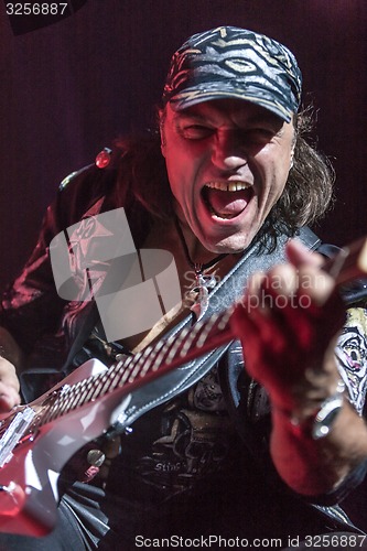 Image of DNIPROPETROVSK, UKRAINE - OCTOBER 31: Matthias Jabs from Scorpions rock band performs live at Sports Palace SC \"Meteor\". \"Final tour\"concert on October 31, 2012 