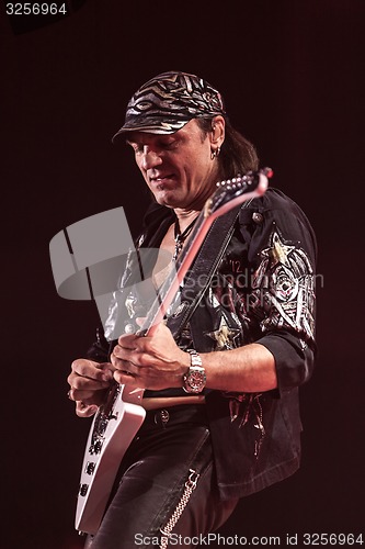 Image of DNIPROPETROVSK, UKRAINE - OCTOBER 31: Matthias Jabs from Scorpions rock band performs live at Sports Palace SC \"Meteor\". \"Final tour\"concert on October 31, 2012 in DNIPROPETROVSK, UKRAINE