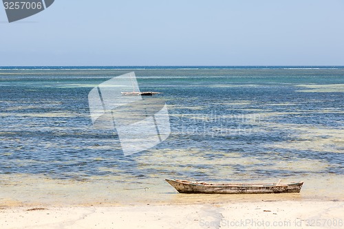 Image of Old wooden arabian dhow in the ocean 